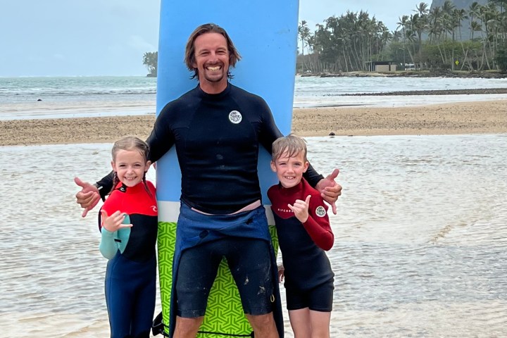Alyssa Shafer et al. standing on a beach posing for the camera