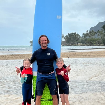 Alyssa Shafer et al. standing on a beach posing for the camera